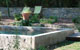Piscine maçonnée, type bassin provençal, enduit ciment naturel